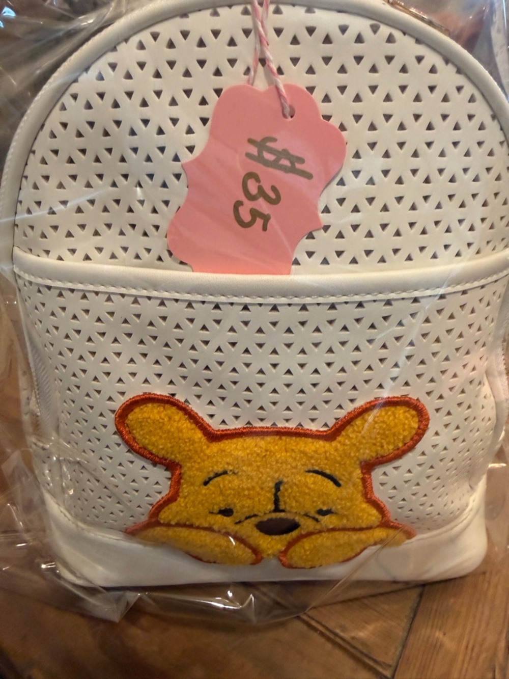 Disney White Mini Backpack with Yellow Character Patch